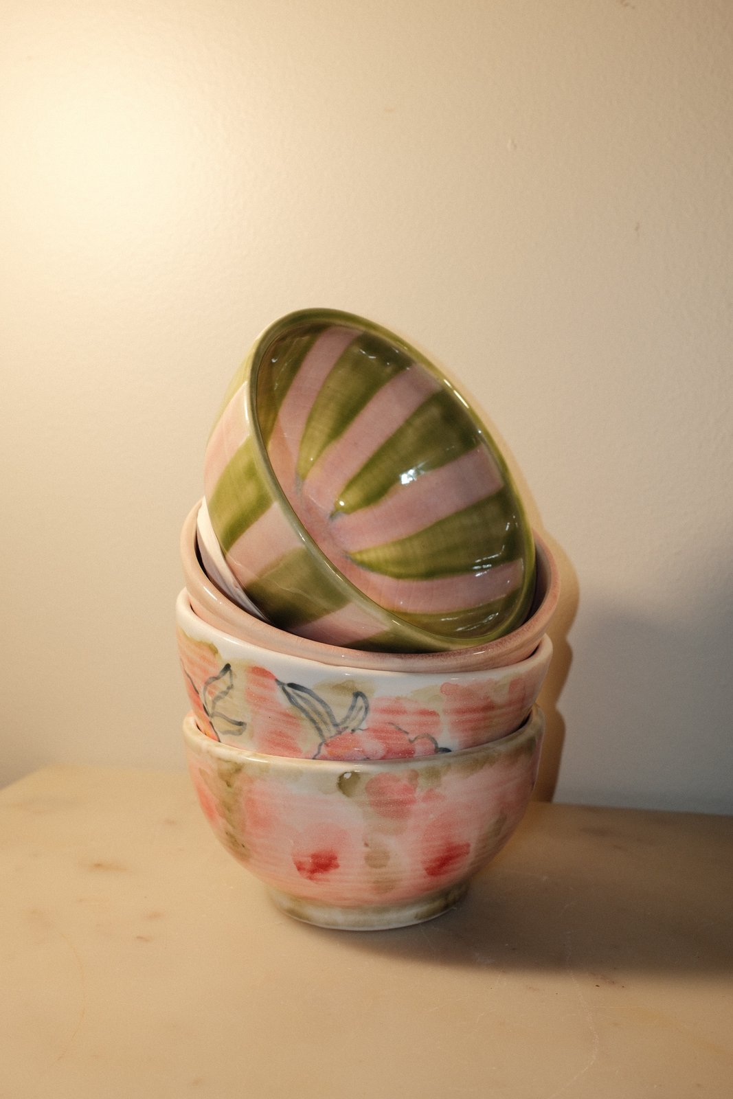 Pink floral and green striped bowls, set of 2