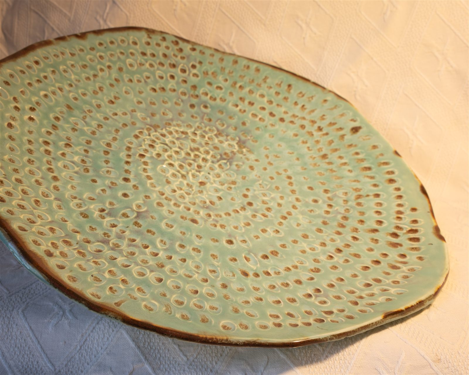 Green stamped dot plate